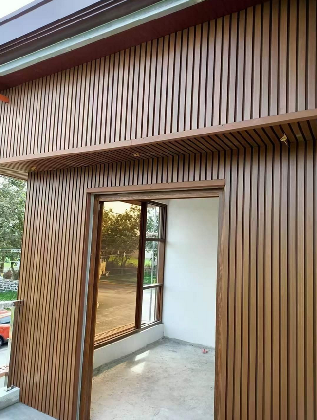 Sample of Outdoor WPC flute wall panel with contemporary ribbed design for exterior cladding