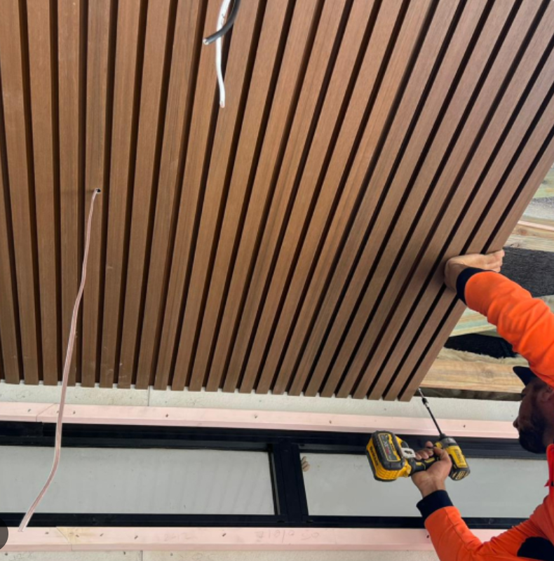 Outdoor WPC flute panel sample showing modern exterior wall cladding texture and weather-resistant finish